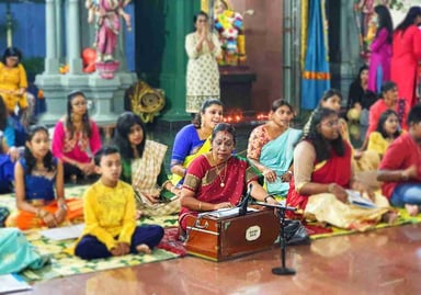 singing thevaram in a Mariamman temple during Sivarathiri