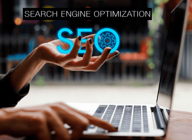 a person holding SEO with search engine optimization displayed