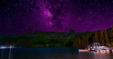 Nighttime with boats and Milky Way at Lake Mary in the Mammoth Lakes Basin