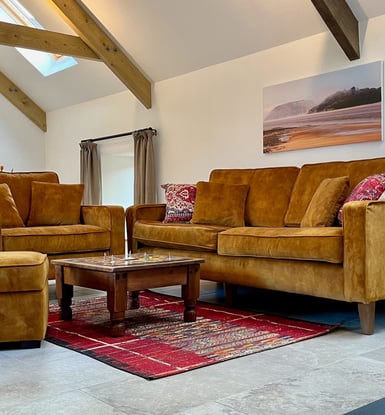 a living room with a couch and a table