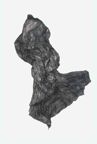 a photograph of a sculpture reminiscent of a running woman