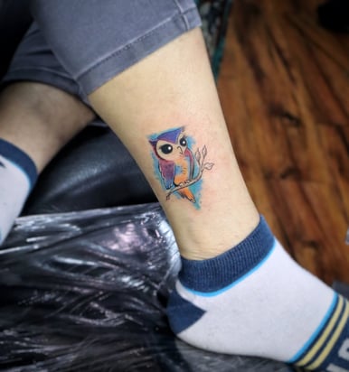 Watercolor Owl tattoo by Dudo's Tattoos Hyderabad