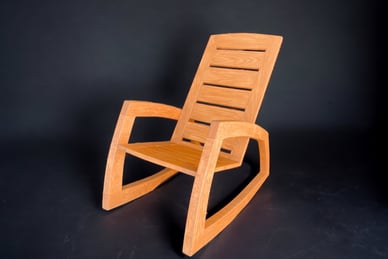 a rocking chair with a wooden rocking chair