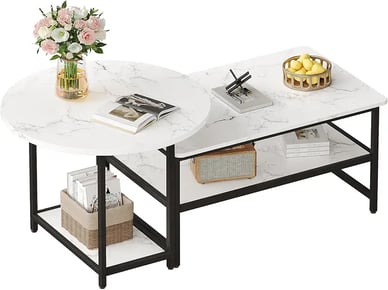 a white marbled coffee table with a vase of flowers