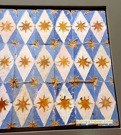 Fun blue & white shapes with stars form arabesque patterns on tiles in Royal Alcazar in Seville