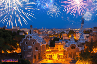A nightview from Barcelona and fireworks in the sky over a city