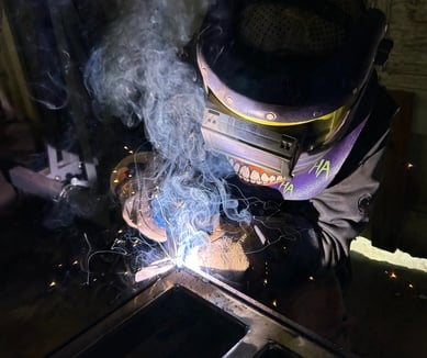 jaspar schirmer welding a steel beam