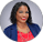a woman in a red top and blue blazer jacket