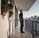 man standing near balcony