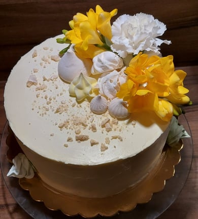 a cake with flowers on a plate