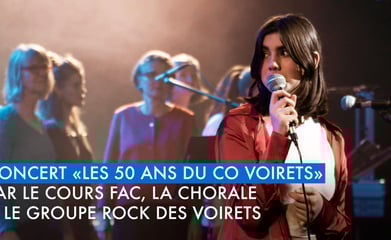 a woman singing into a microphone with a microphone