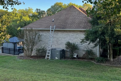 image of a residential shingle roof that has been cleaned using a soft wash method to remove growth