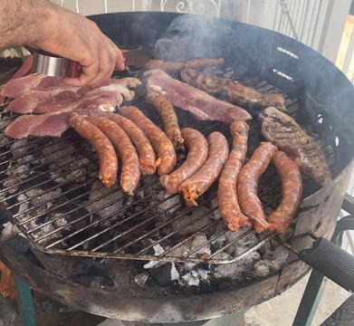Grilling Sicillian food at hour digital nomad house in Sicily