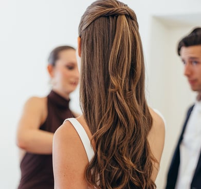 Beautiful long hair styled into half up half down hairstyle