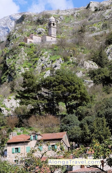 a steep  ⛰ & Our Lady of Health Church seemingly hanging on the cliff in Kotor