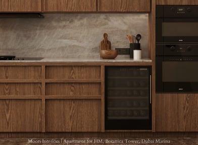Modern kitchen with wooden cabinetry, marble backsplash, and a built-in wine fridge.