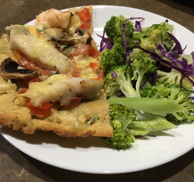 portioned pizza with vegetables