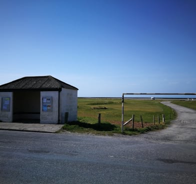 Ynyslas turn bus stop and track leading into the campervan car park