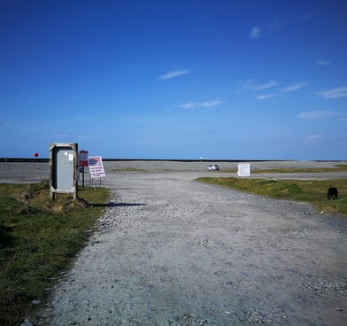 Entrance to Ynyslas turn camper van car park.