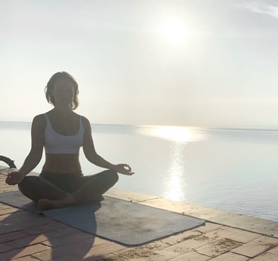 yoga, meditation and pranayama teacher Katharina Kunze meditating in Sicily