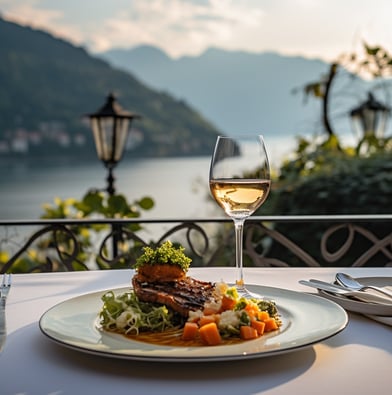 a plate of food and wine on a table