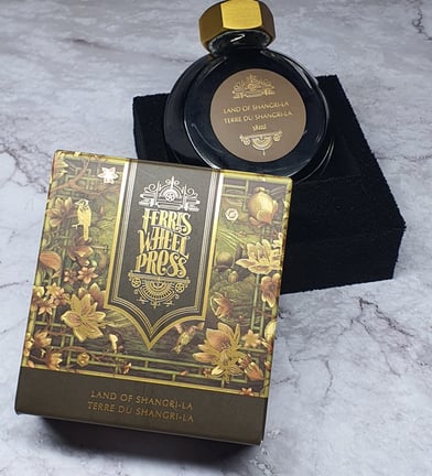 Ferris Wheel Press ink bottle and packaging for Land of Shangri-La ink