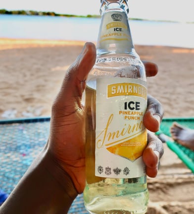 A bottle of Smirnoff Ice on Ada Beach