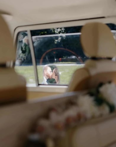 Wedding couple photographed in a mirror