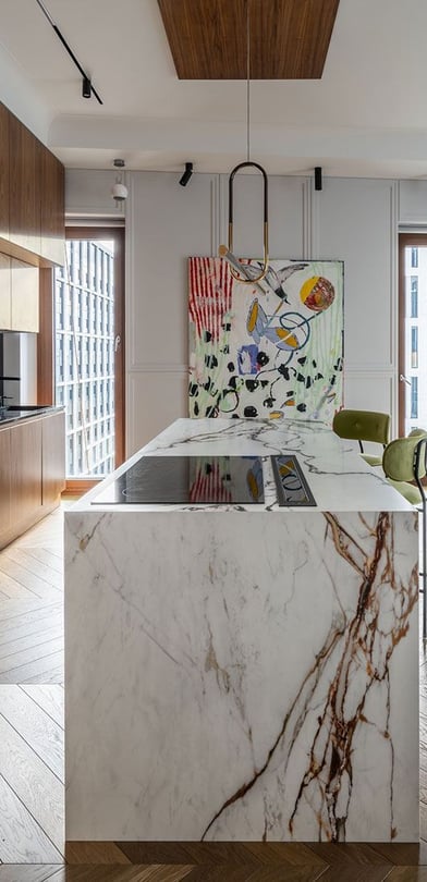 a kitchen with a marbled counter top