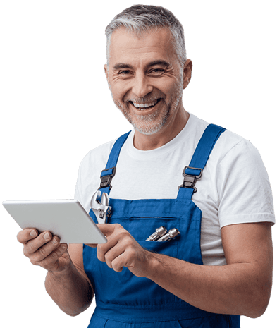 a man in overalls and overalls holding a tablet computer