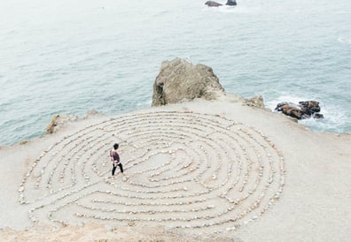 a man walking through a maze