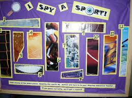 sports bulletin board for middle school with photographs and words I spy a sport 