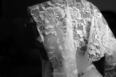 young lady vailed black and white