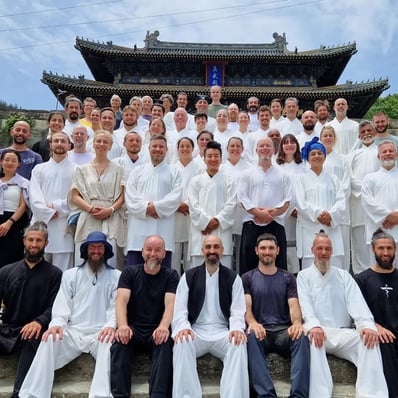 The WDP World family gathers in harmony beneath Wudang’s ancient Wu Long Gong, Five Dragons Temple, 2024.