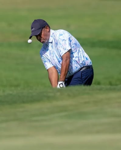 Par Four Golf Club image of Carl Palmer chips onto the green during the final day of the Calvin Washington Memorial 50th Ann