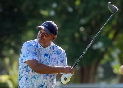 Par Four Golf Club image of Carl Palmer tees off during the final day of the Calvin Washington Memorial 50th Annual Par 4 Gol