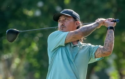 Par Four Golf Club image of Justin Corben tees off during the final day of the Calvin Washington Memorial 50th Annual Par 4 G