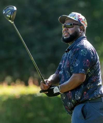 Par Four Golf Club image of Lonnie Malone tees off during the final day of the Calvin Washington Memorial 50th Annual Par 4 G