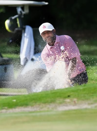 Par Four Golf Club image of Nate Bryant hits out of the bunker during the final day of the Calvin Washington Memorial 50th An