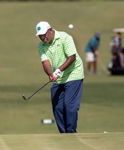 Par Four Golf Club image of Pete Johnson hits onto the green during the final day of the Calvin Washington Memorial 50th Ann