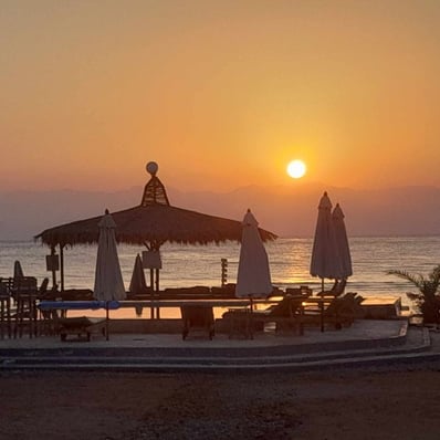 Sunrise view from the pool with sea view at Bedouin star