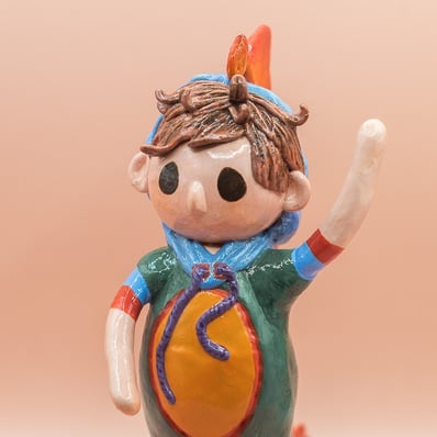 dino boy epoxy clay small sculpture