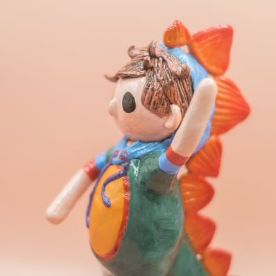 dino boy epoxy clay small sculpture