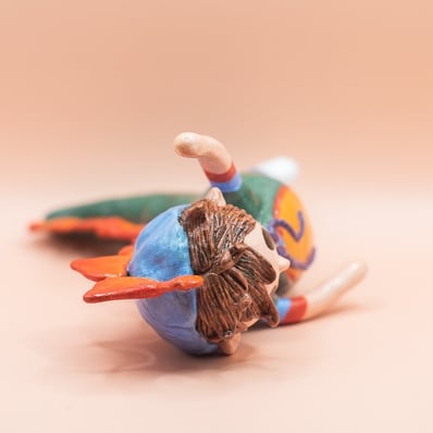dino boy epoxy clay small sculpture