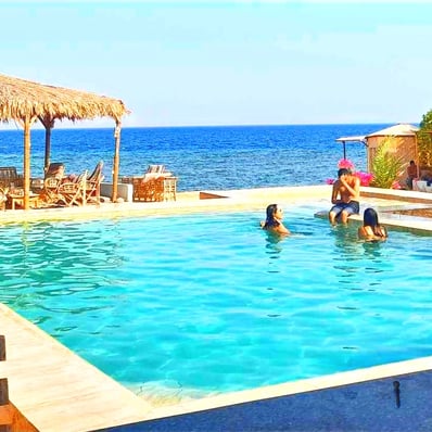 Holiday time guests in the pool at Bedouin star