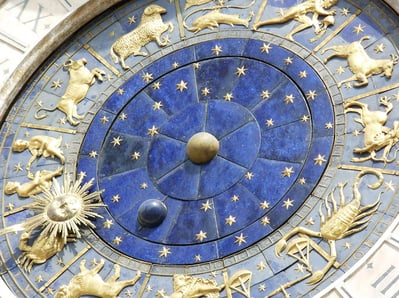 symbolic representation of the watch with astrological symbols
