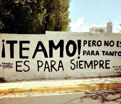 a sign that says teamwork is written on the side of a wall