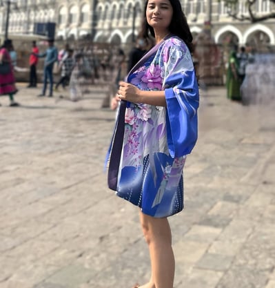 a woman in a kimono Jacket