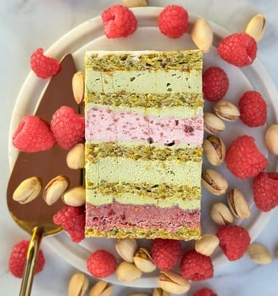 a piece of cake with a slice of cake on top of it