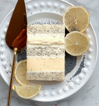 a piece of cake with nuts and nuts on a plate